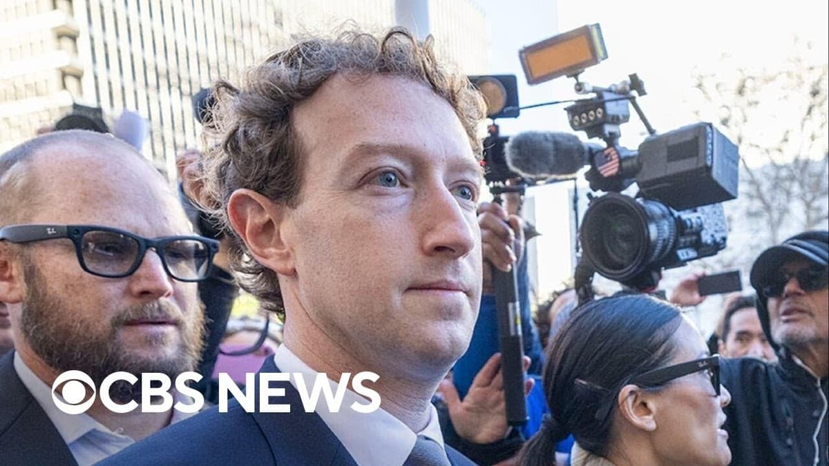 Mark Zuckerberg utenfor rettssalen omgitt av kameraer